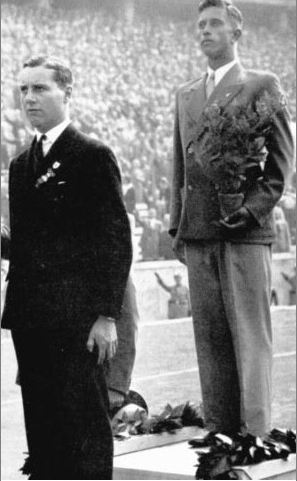 Photo of (Sir) Peter Scott receiving medal 1938 Olympics