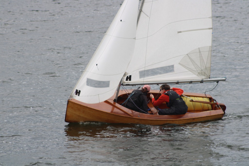 Jamie and Chloe Webb on the move in a freshly varnished boat